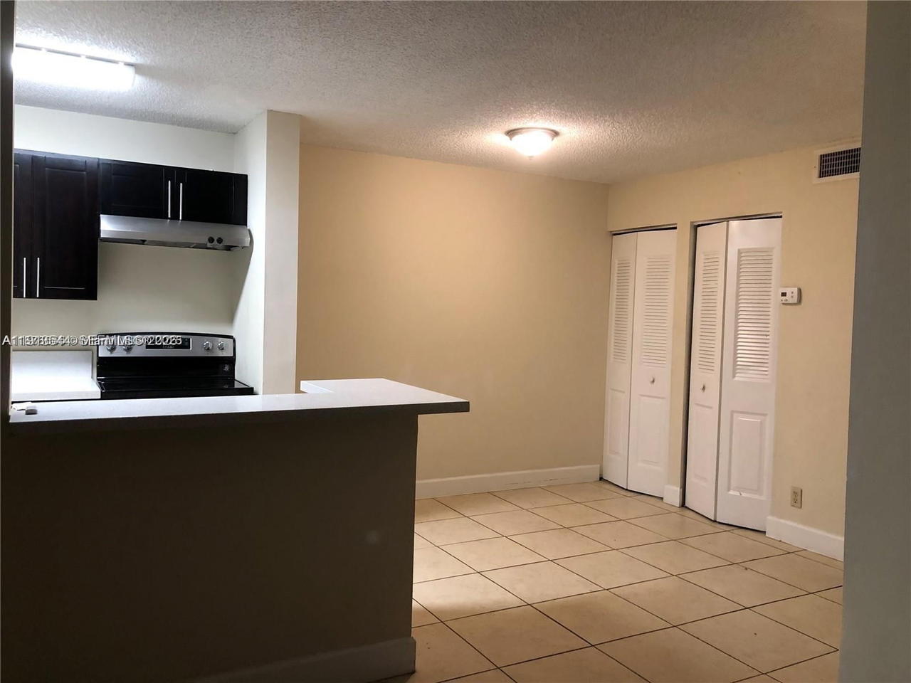 Real estate property located at 10757 Cleary Blvd #104, Broward, Lakes Of Jacaranda Condo, Plantation, FL