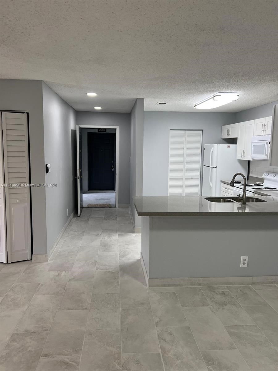 Real estate property located at 11205 Atlantic Blvd #203, Broward, Atlantic Springs Condo, Coral Springs, FL