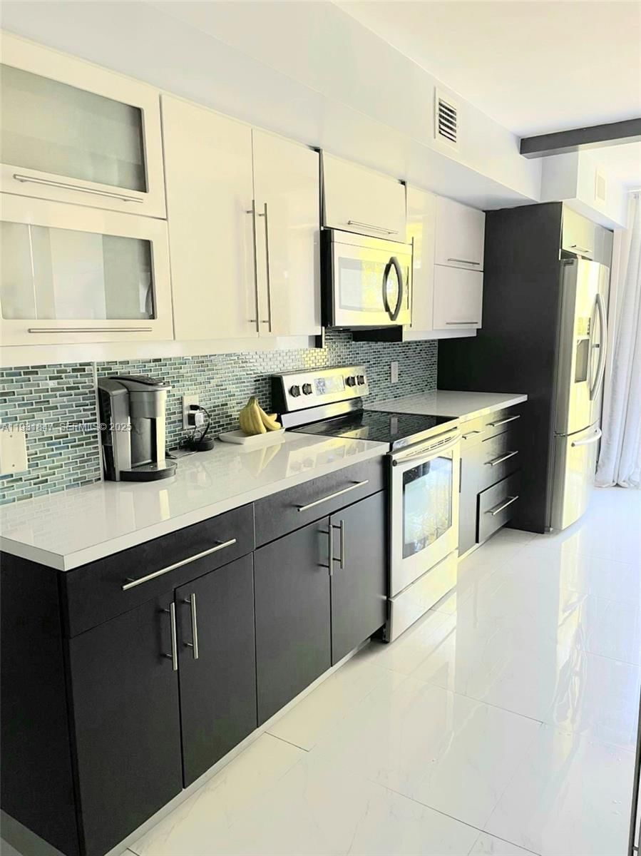 Real estate property located at 9410 Flagler St #409, Miami-dade, Versialles Gardens Ii Con, Miami, FL