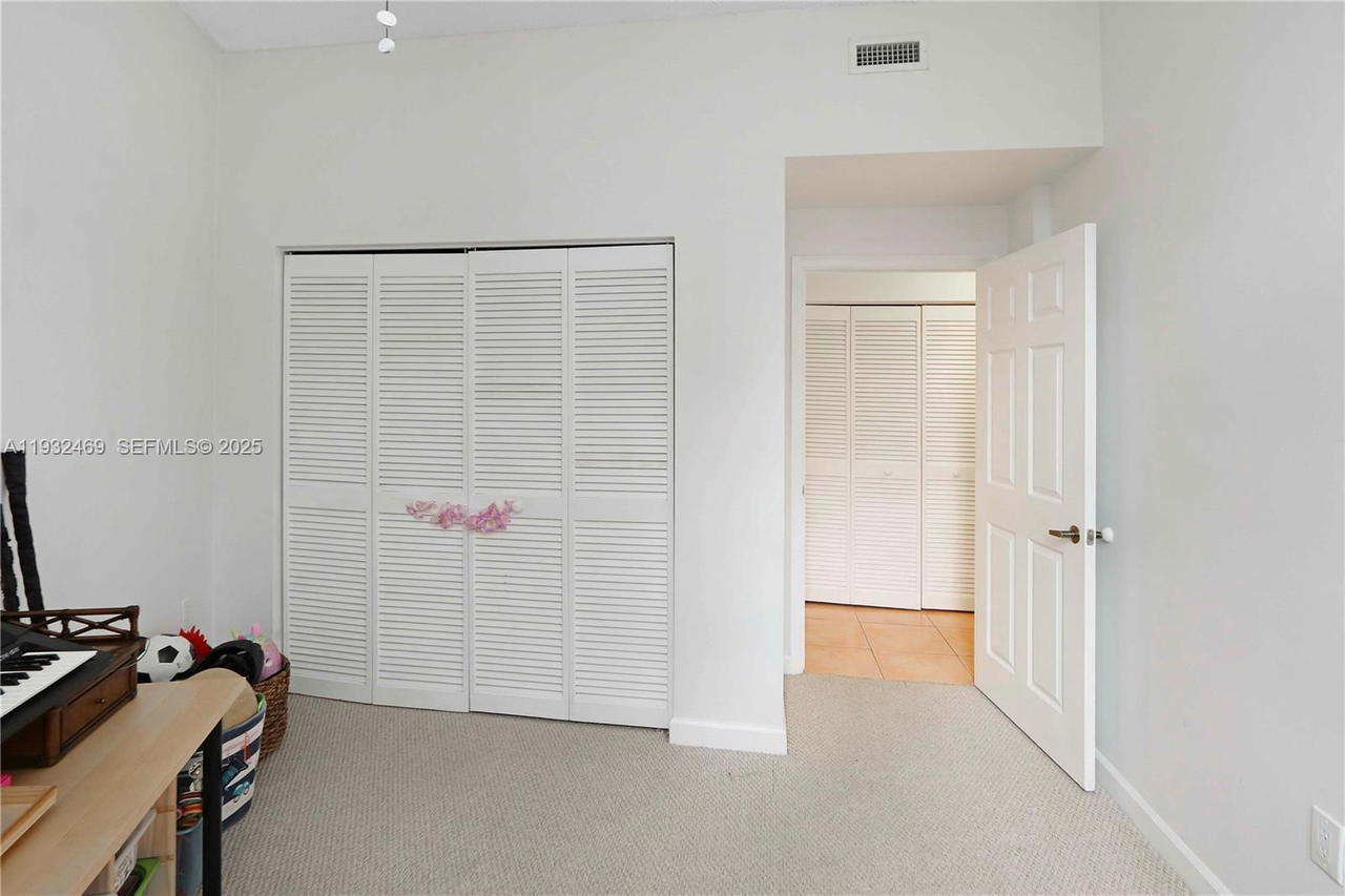 Real estate property located at 9805 52nd St #102, Miami-dade, Doral House Condo No 2, Doral, FL