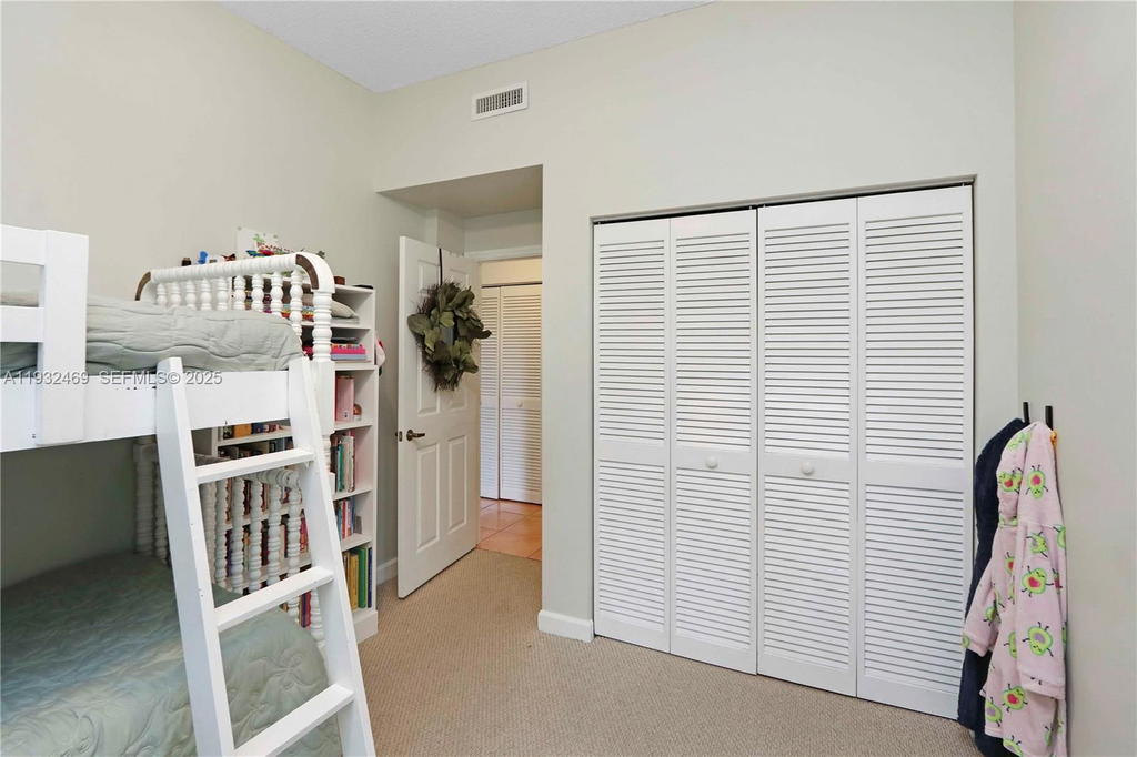 Real estate property located at 9805 52nd St #102, Miami-dade, Doral House Condo No 2, Doral, FL