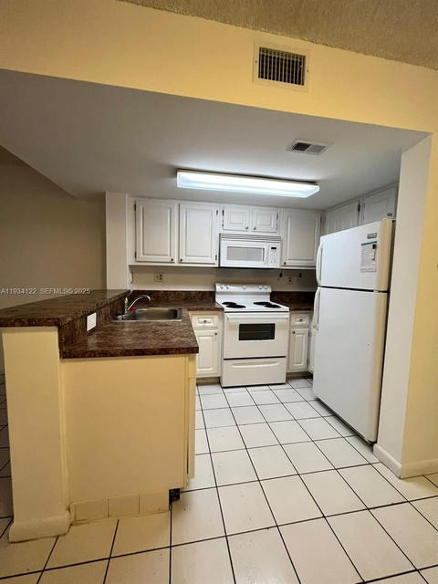Real estate property located at 8660 5th Ter #15-107, Miami-dade, Coral Pointe Townhomes Co, Miami, FL