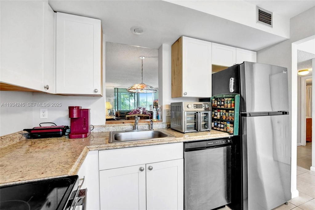 Real estate property located at 7684 18th St #202, Broward, 12 Of Palm Springs 2 Cond, Margate, FL