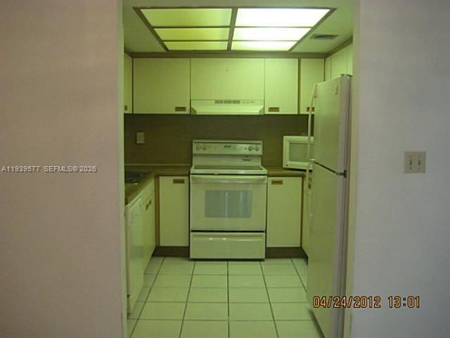 Real estate property located at 9015 125th Ave N406, Miami-dade, Kenland Pointe Condo #1, Miami, FL