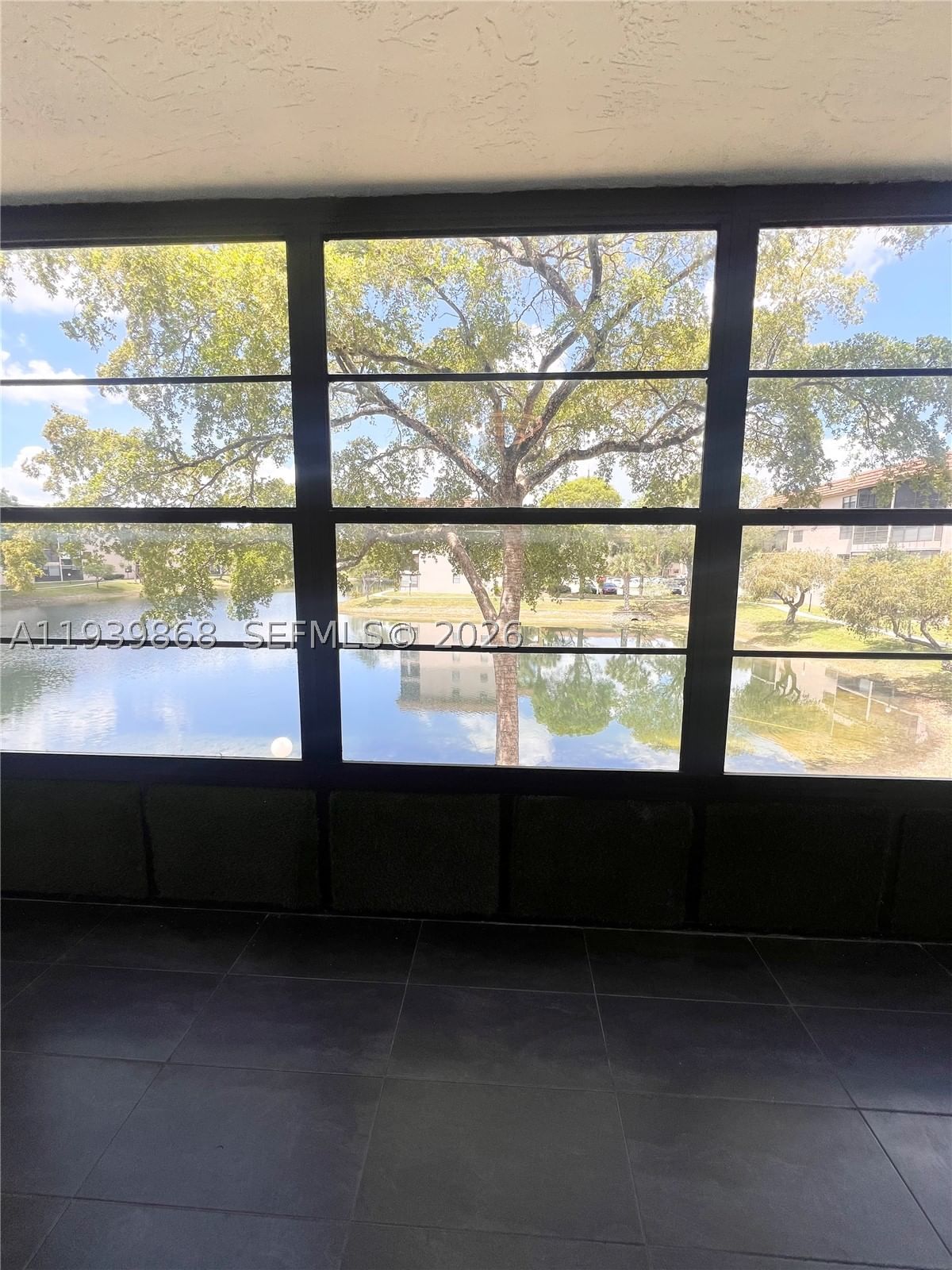 Real estate property located at 4930 Sabal Palm Blvd #206, Broward, Lakes Of Carriage Hills, Tamarac, FL