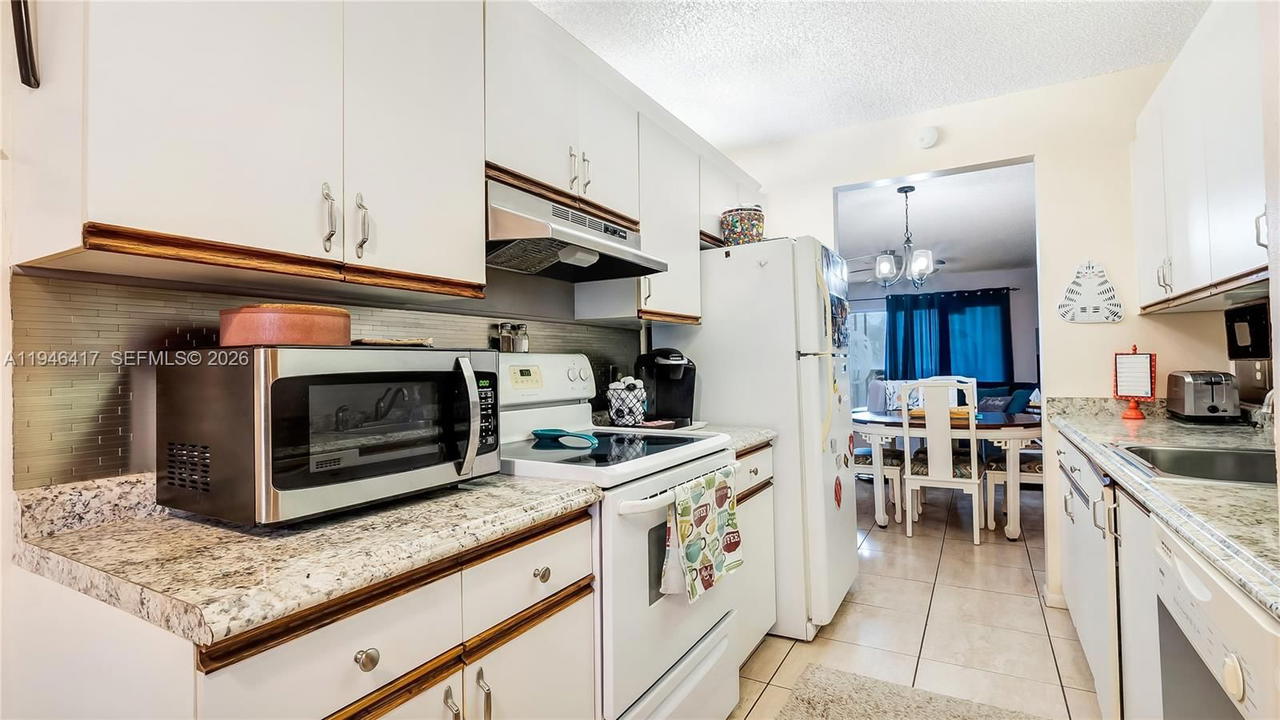 Real estate property located at 1351 125th Ave #203S, Broward, Cambridge At Century Vill, Pembroke Pines, FL