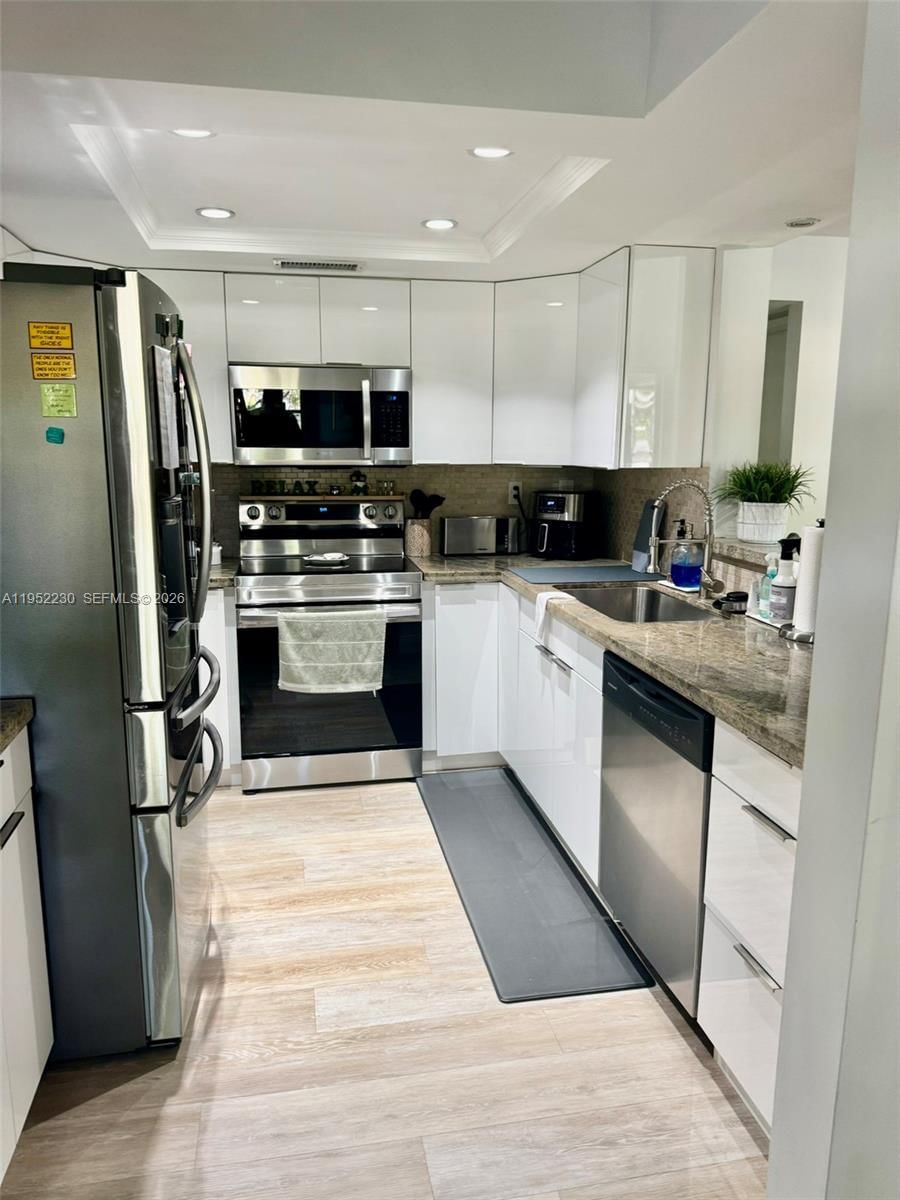Real estate property located at 8810 123rd Ct M202, Miami-dade, Kenland Bend North Condo, Miami, FL