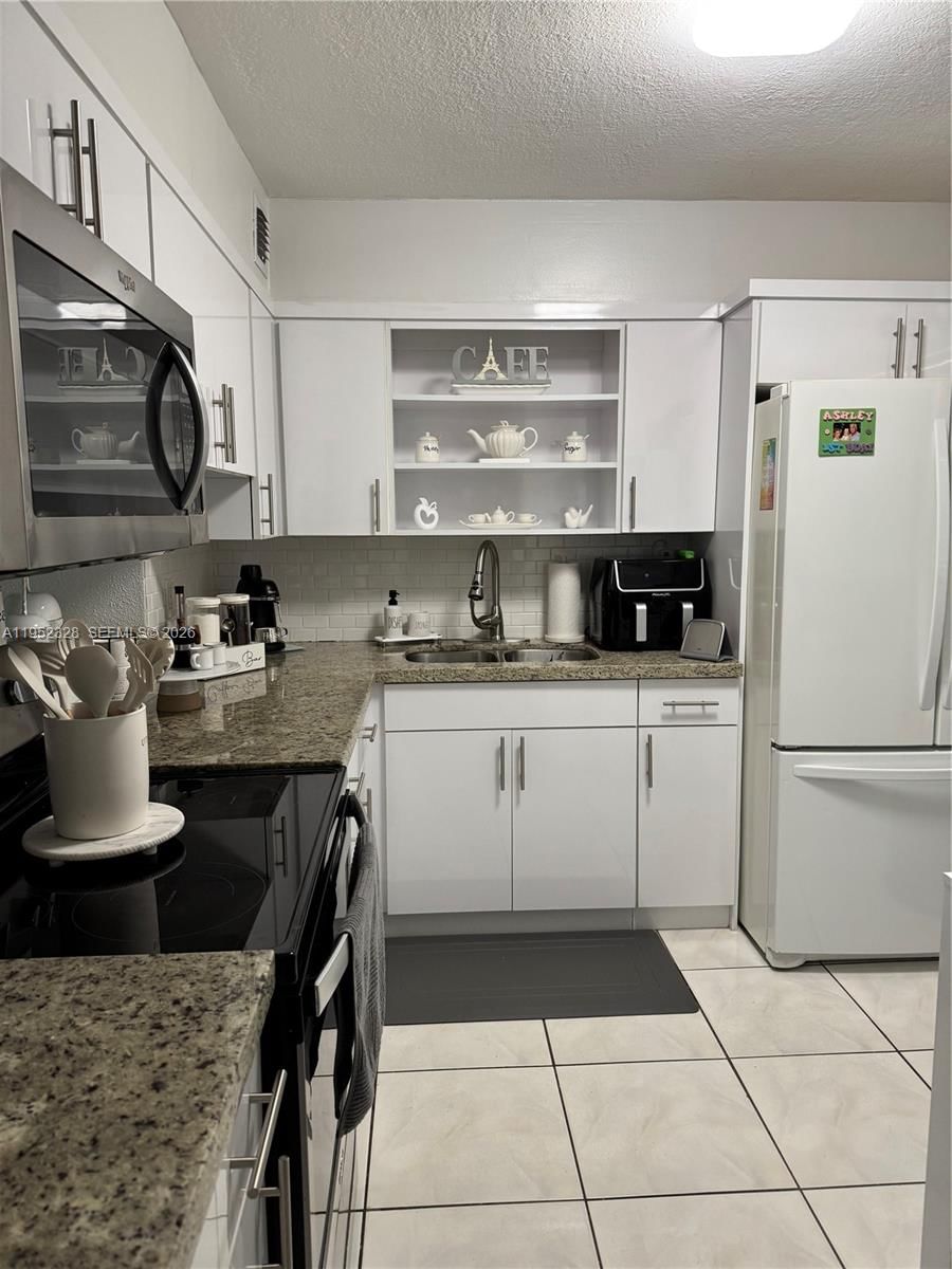 Real estate property located at 1480 46th St #203, Miami-dade, Casa Real Condo, Hialeah, FL