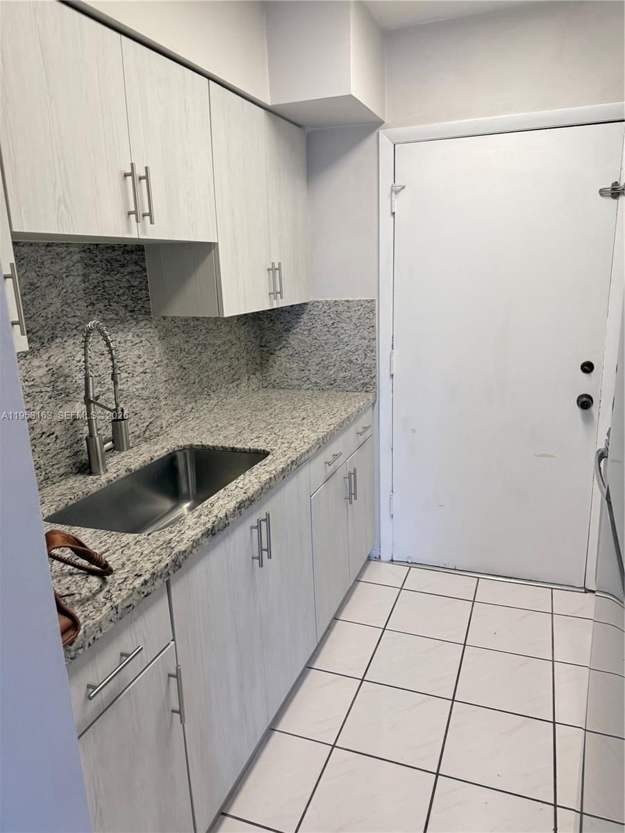 Real estate property located at 685 Miller Drive #404E, Miami-dade, Spring Towers Condominium, Miami Springs, FL