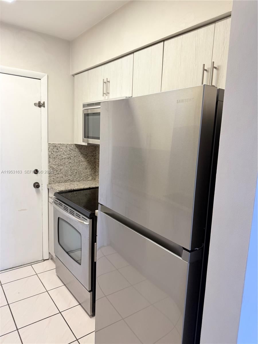 Real estate property located at 685 Miller Drive #404E, Miami-dade, Spring Towers Condominium, Miami Springs, FL