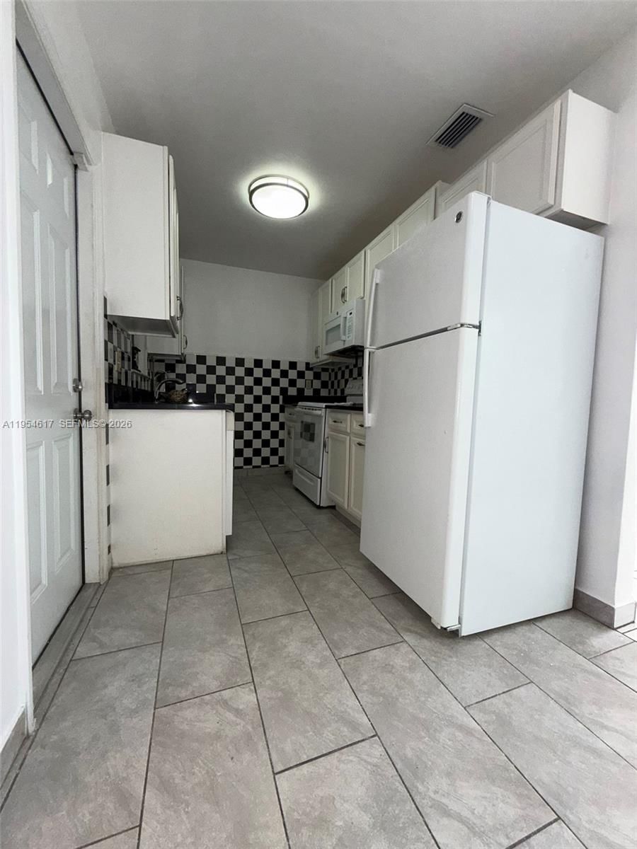 Real estate property located at 9825 54th St, Miami-dade, Tropical Estates 1st Addn, Miami, FL