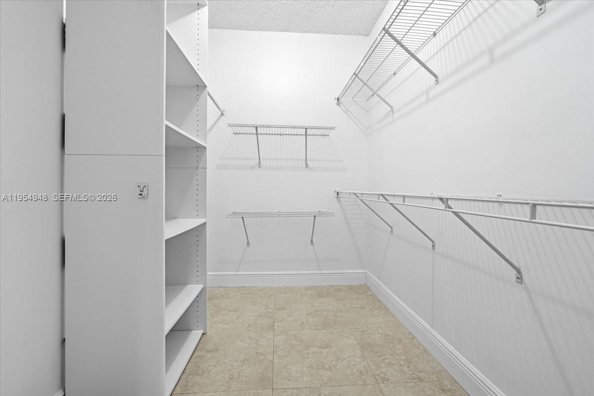 Real estate property located at 491 Racquet Club Rd #107, Broward, Bldg 130 Of Country Club, Weston, FL