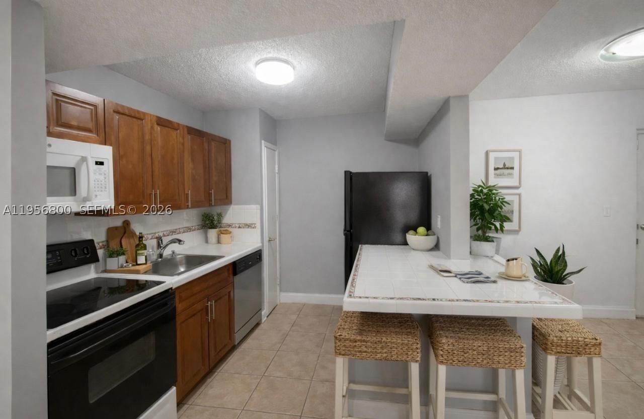 Real estate property located at 850 129th Pl #103, Miami-dade, University Trail Condo, Miami, FL