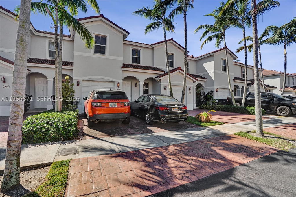 Real estate property located at 1042 207th Ter, Miami-dade, Ives Dairy Townhomes, Miami, FL