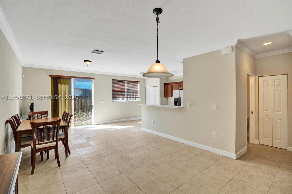 Real estate property located at 1042 207th Ter, Miami-dade, Ives Dairy Townhomes, Miami, FL