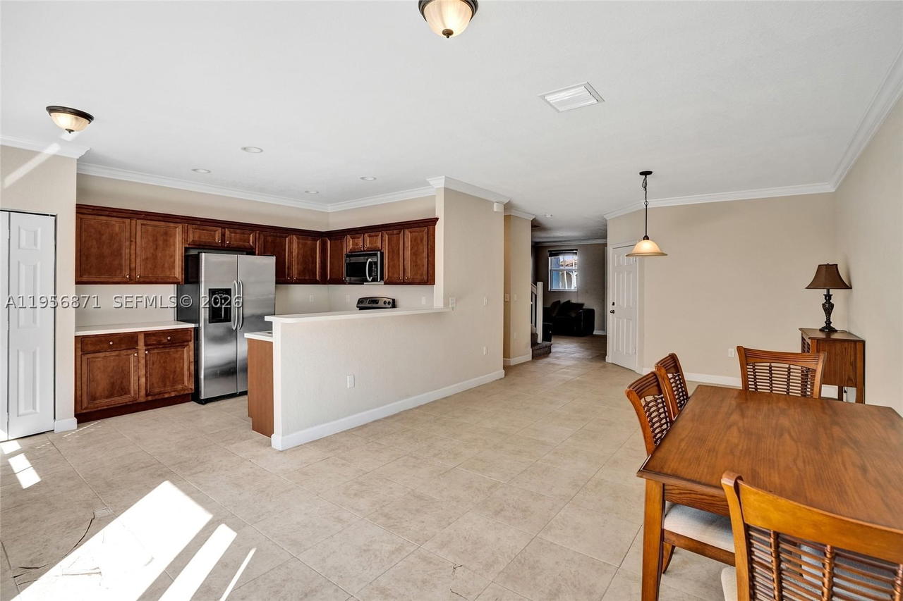 Real estate property located at 1042 207th Ter, Miami-dade, Ives Dairy Townhomes, Miami, FL