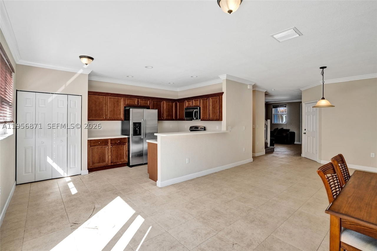 Real estate property located at 1042 207th Ter, Miami-dade, Ives Dairy Townhomes, Miami, FL
