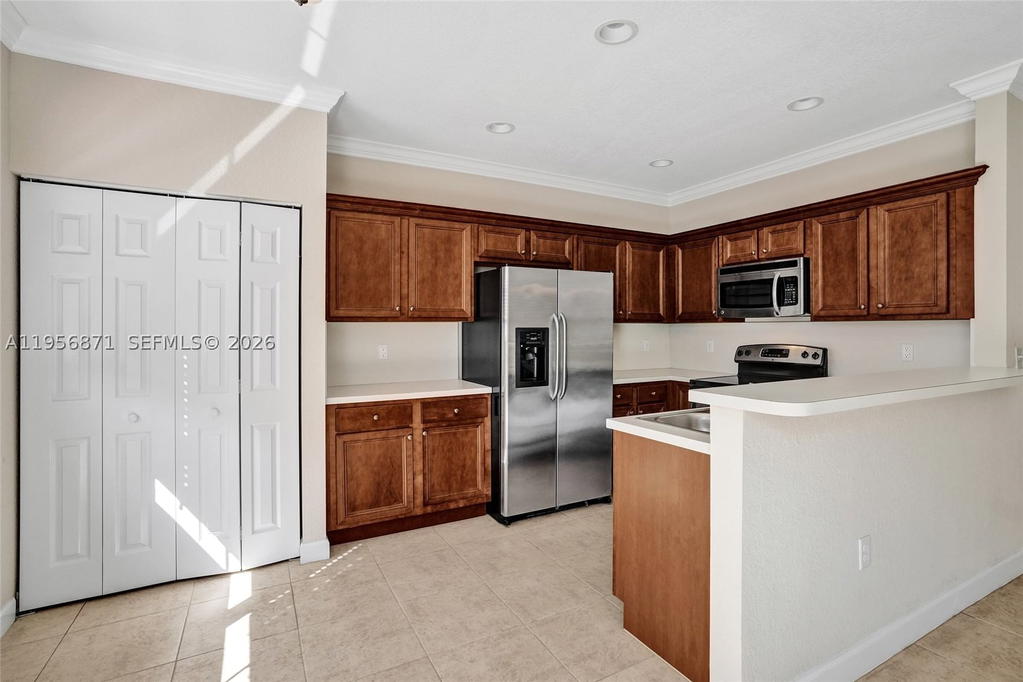 Real estate property located at 1042 207th Ter, Miami-dade, Ives Dairy Townhomes, Miami, FL