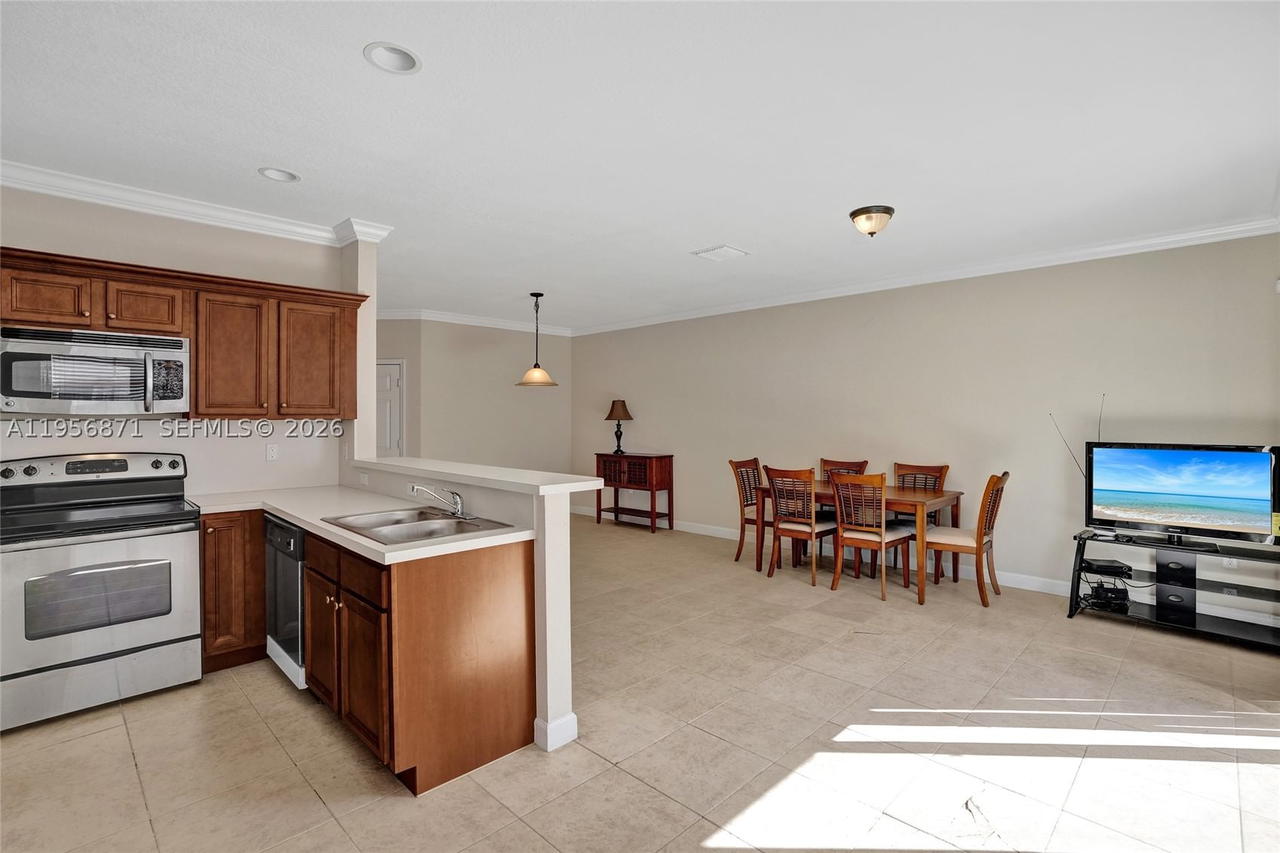Real estate property located at 1042 207th Ter, Miami-dade, Ives Dairy Townhomes, Miami, FL