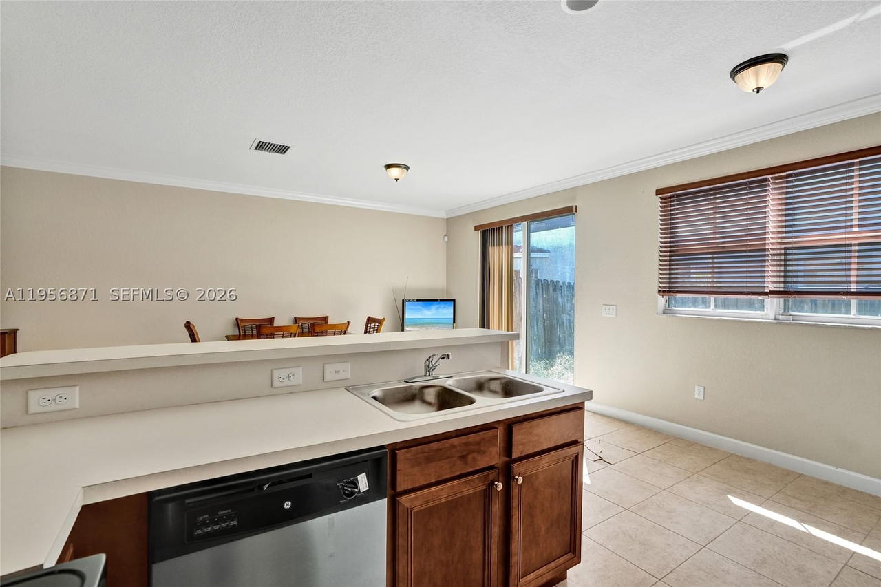 Real estate property located at 1042 207th Ter, Miami-dade, Ives Dairy Townhomes, Miami, FL