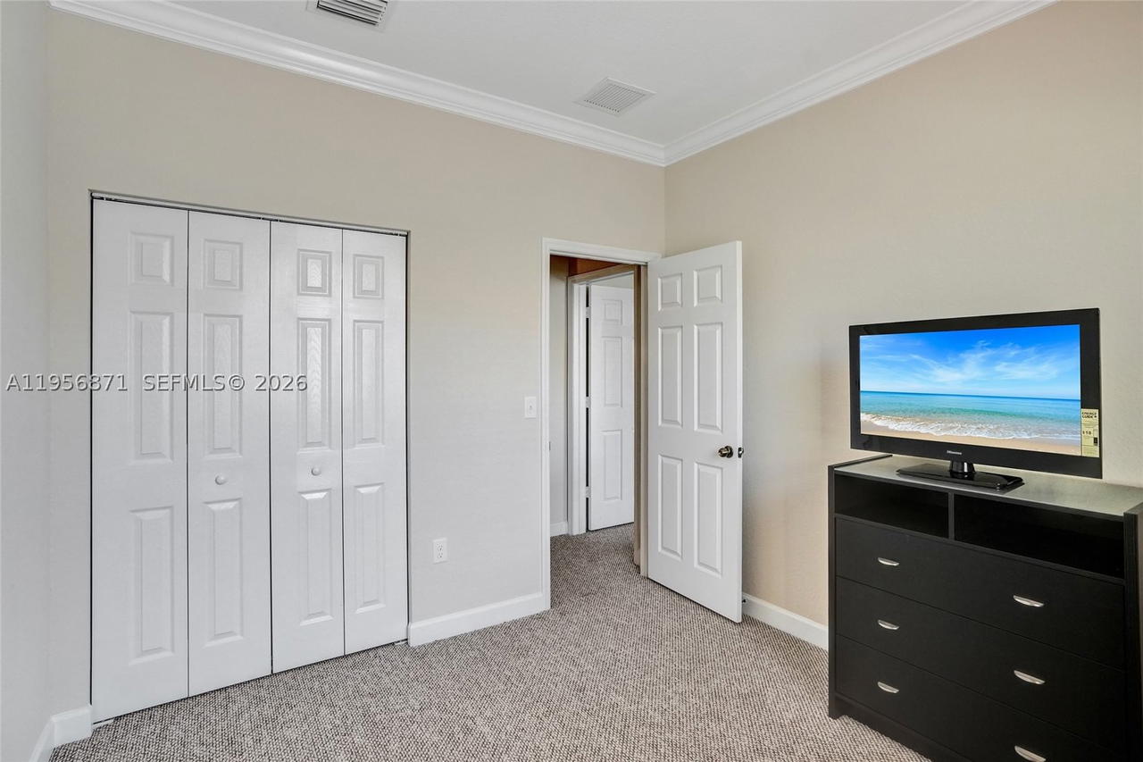 Real estate property located at 1042 207th Ter, Miami-dade, Ives Dairy Townhomes, Miami, FL