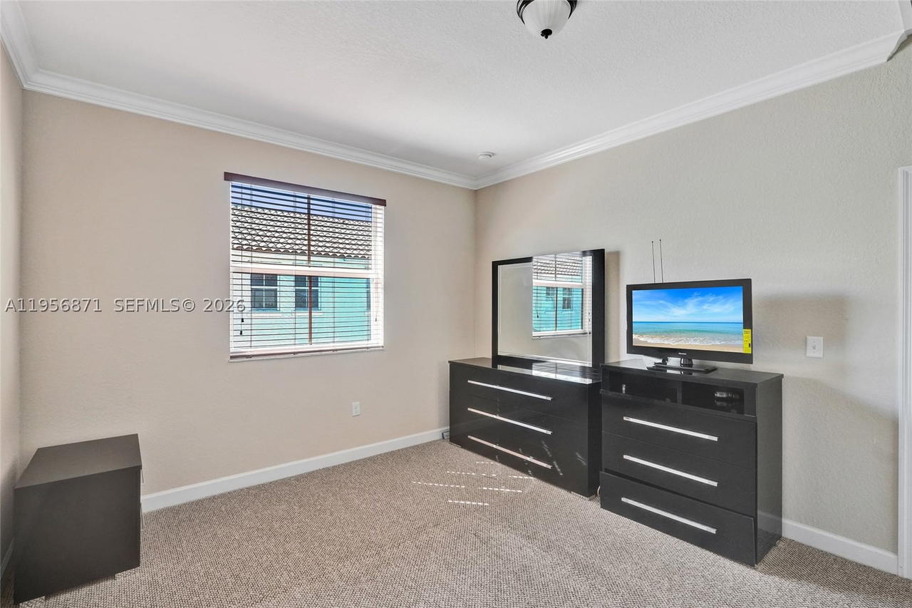 Real estate property located at 1042 207th Ter, Miami-dade, Ives Dairy Townhomes, Miami, FL