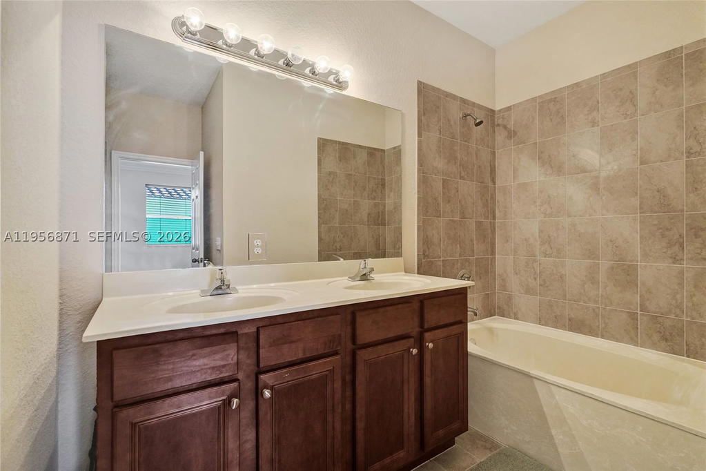 Real estate property located at 1042 207th Ter, Miami-dade, Ives Dairy Townhomes, Miami, FL