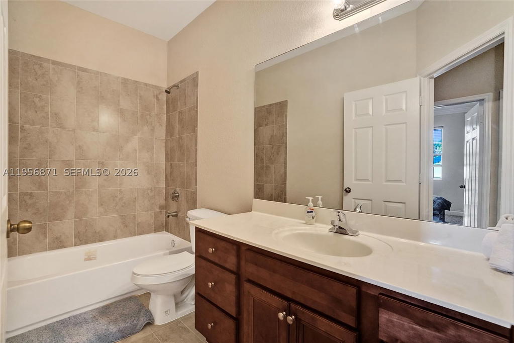 Real estate property located at 1042 207th Ter, Miami-dade, Ives Dairy Townhomes, Miami, FL