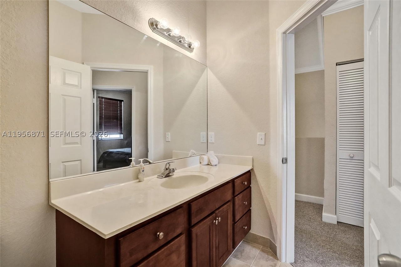 Real estate property located at 1042 207th Ter, Miami-dade, Ives Dairy Townhomes, Miami, FL
