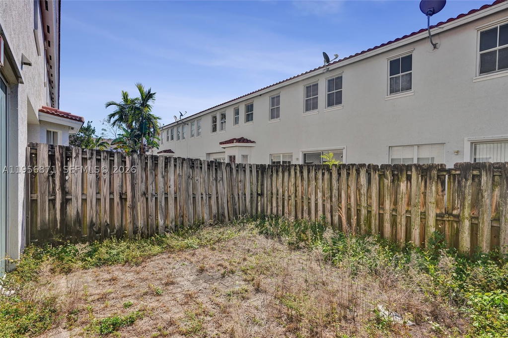 Real estate property located at 1042 207th Ter, Miami-dade, Ives Dairy Townhomes, Miami, FL