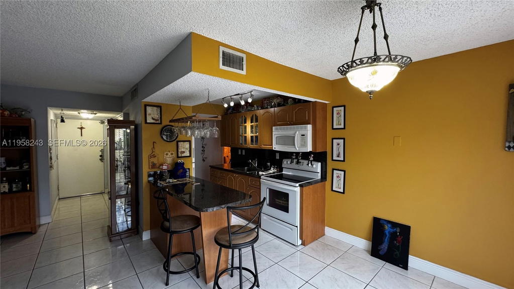 Real estate property located at 9301 4th St #114E, Miami-dade, South Winds Condo, Miami, FL
