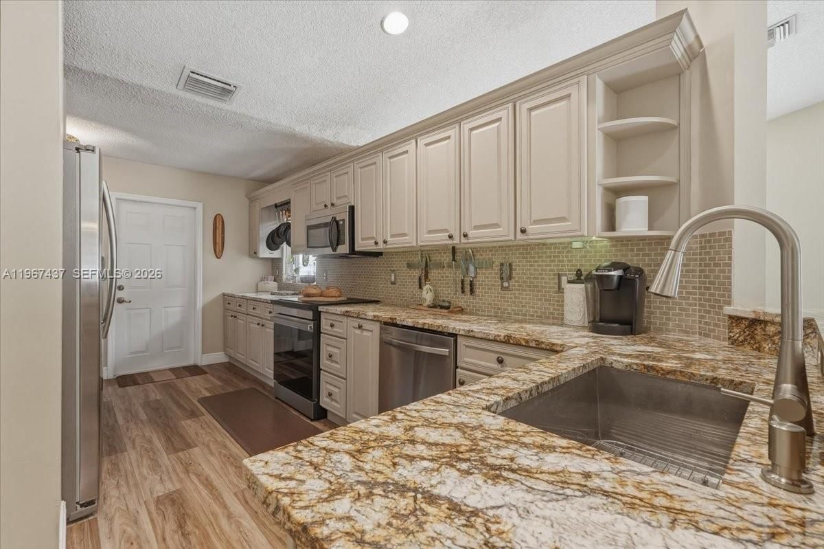 Real estate property located at 12640 7th Pl, Broward, Arboretum, Davie, FL