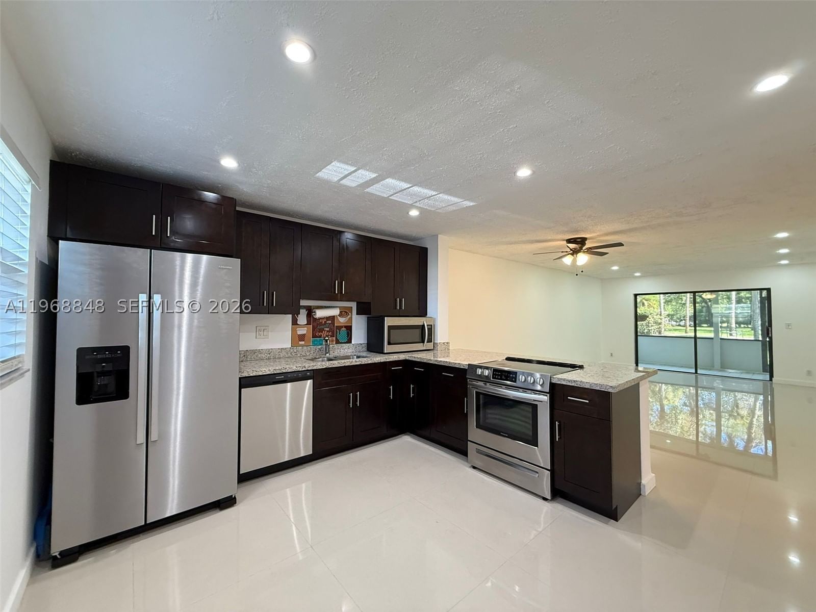 Real estate property located at 6095 Sabal Palm Blvd #103, Broward, Lakes Of Carriage Hills, Tamarac, FL
