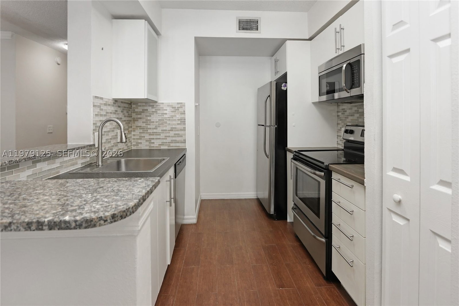 Real estate property located at 2442 Centergate Dr #202, Broward, Aventine At Miramar Condo, Miramar, FL