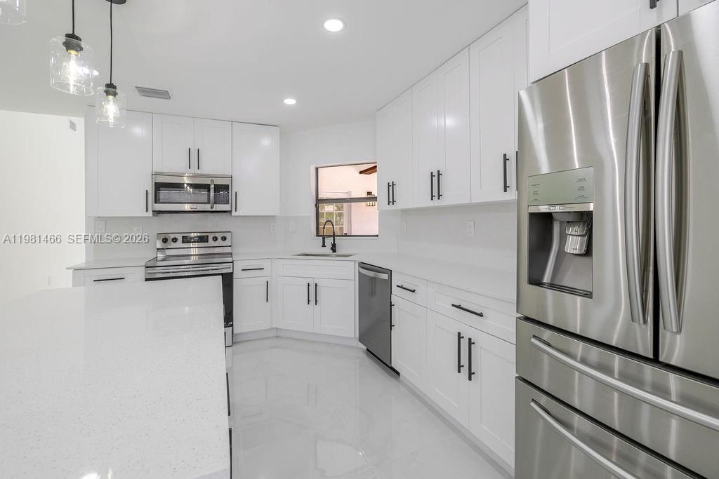 Real estate property located at 8940 4th Ter, Miami-dade, Poinciana Pointe Phase 1, Miami, FL