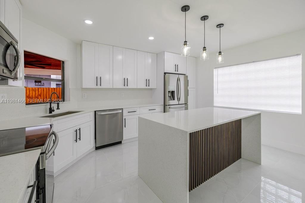 Real estate property located at 8940 4th Ter, Miami-dade, Poinciana Pointe Phase 1, Miami, FL