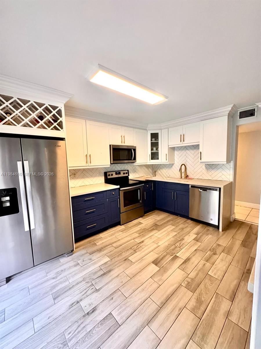 Real estate property located at 7532 86th Ter #104, Broward, Woodmont Apt Homes 67a, Tamarac, FL
