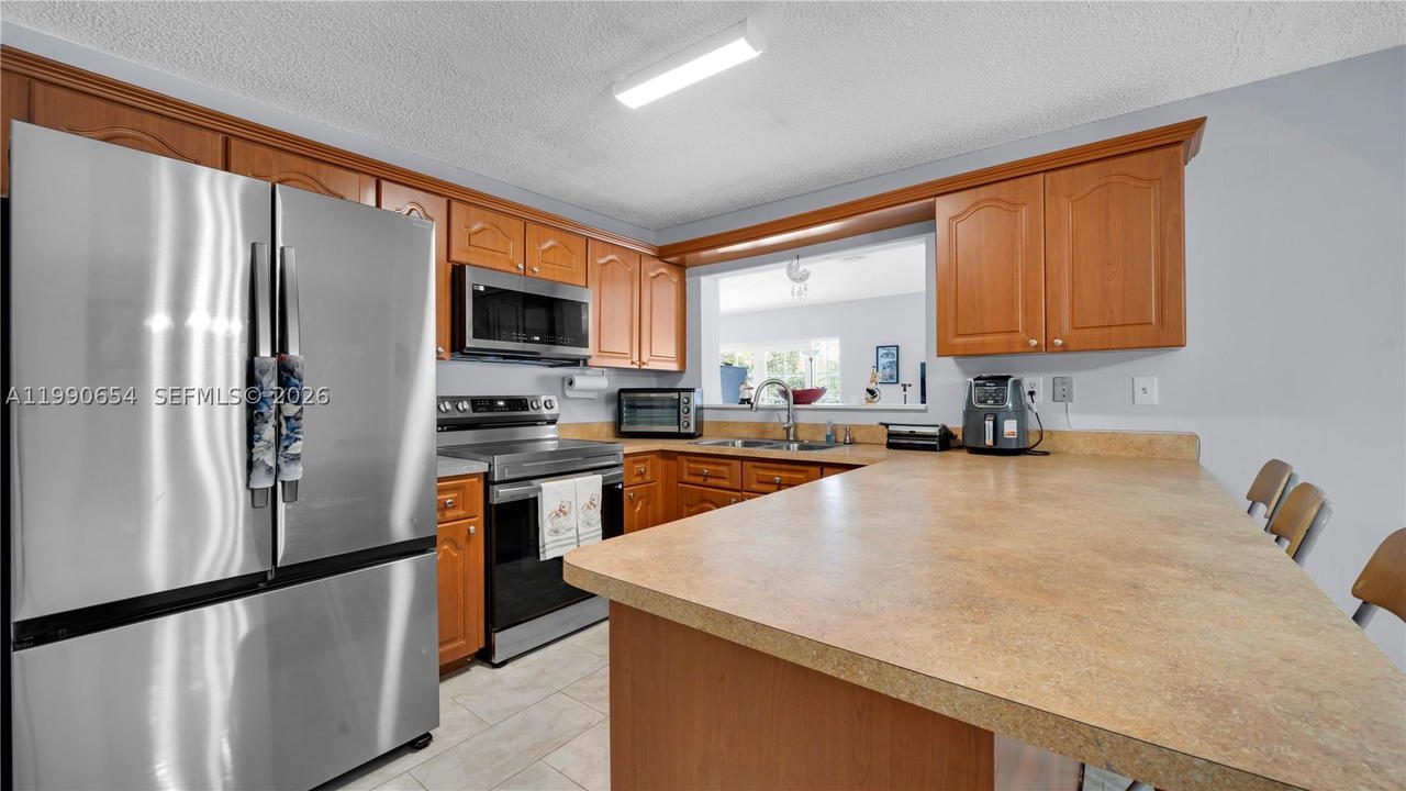 Real estate property located at 10500 159th Ct, Miami-dade, Oakwood At The Hammocks, Miami, FL