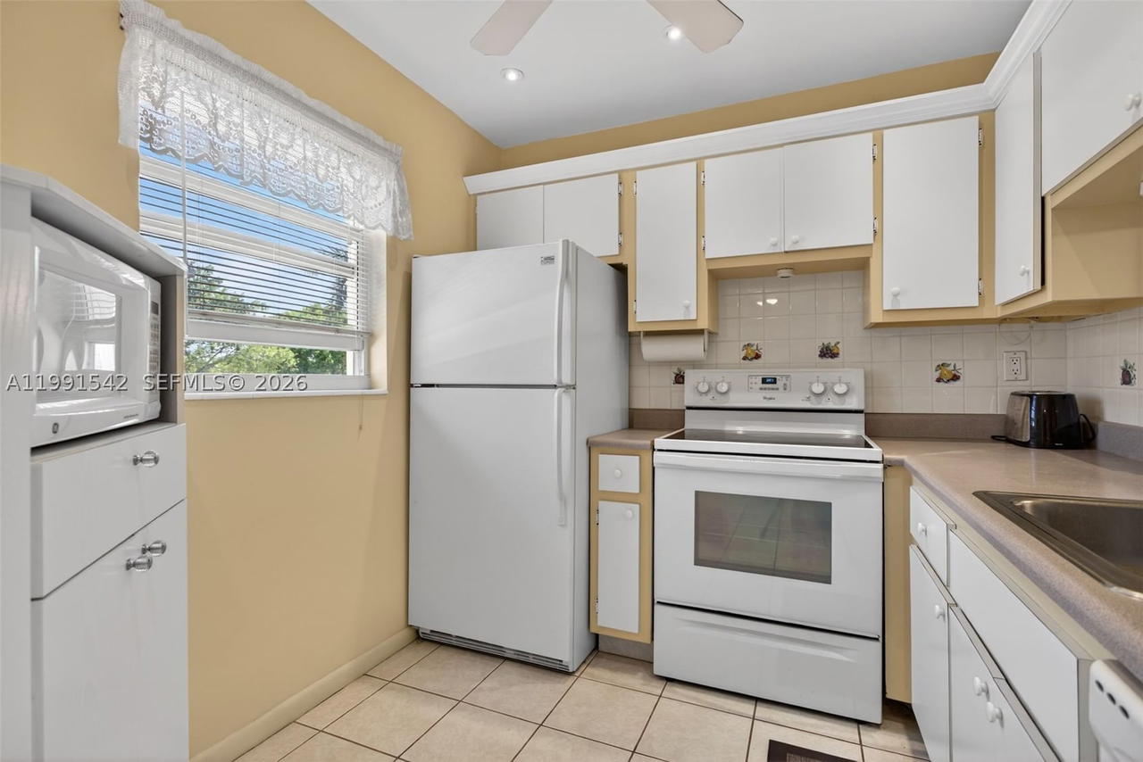 Real estate property located at 4299 16th St #202, Broward, Ashley Hall Condo, Lauderhill, FL