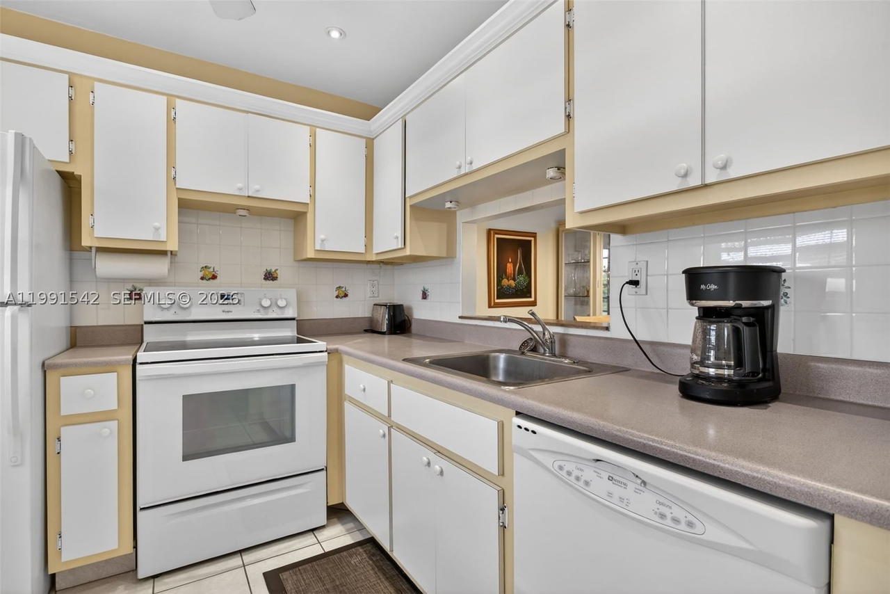Real estate property located at 4299 16th St #202, Broward, Ashley Hall Condo, Lauderhill, FL