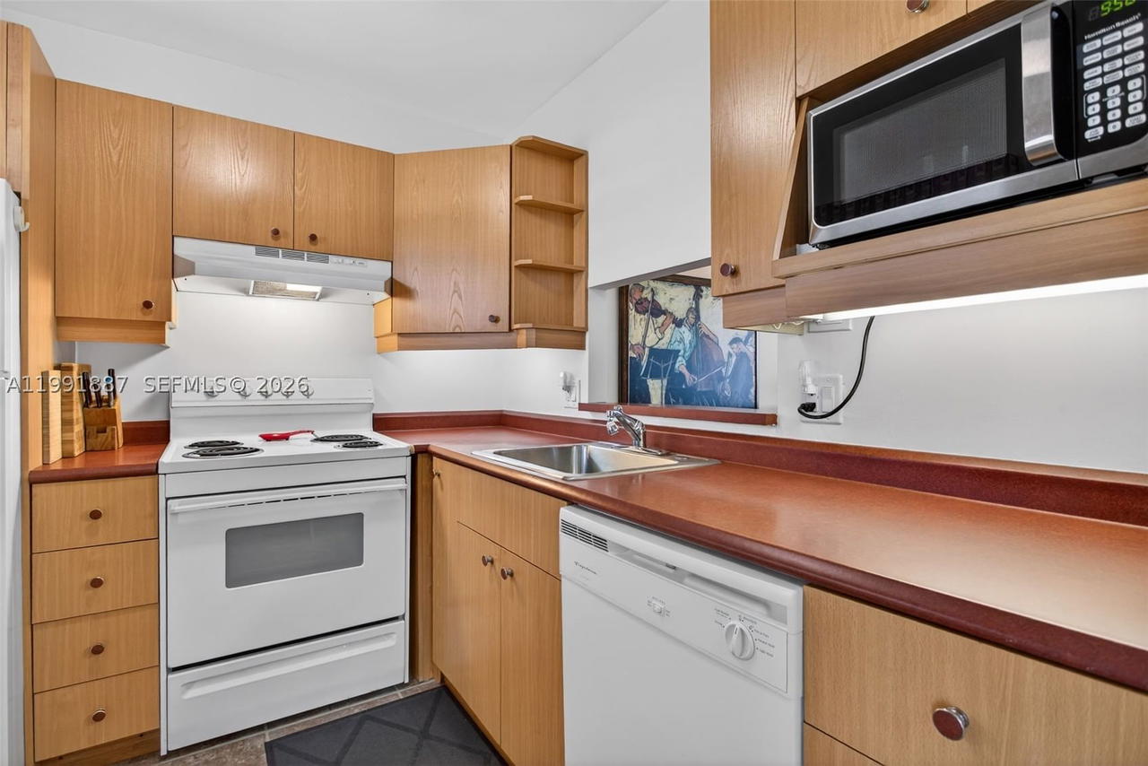 Real estate property located at 4299 16th St #310, Broward, Ashley Hall Condo, Lauderhill, FL
