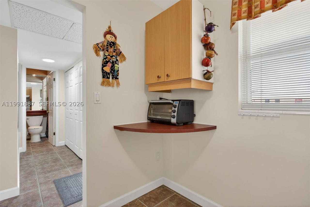 Real estate property located at 4299 16th St #310, Broward, Ashley Hall Condo, Lauderhill, FL