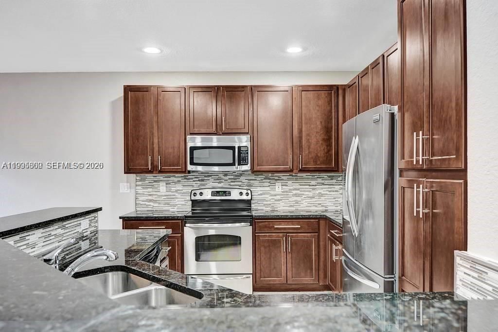 Real estate property located at 4749 Grand Cypress Cir N, Broward, Grand Cypress Replat, Coconut Creek, FL