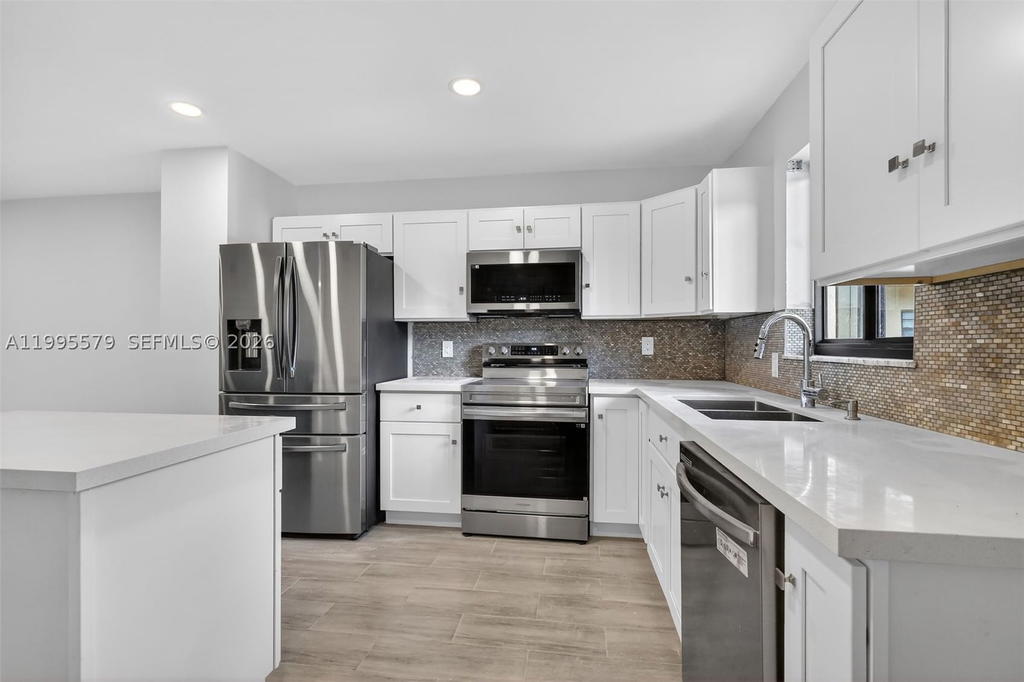 Real estate property located at 275 Gate Rd #104, Broward, Villas At Carriage Hills, Hollywood, FL