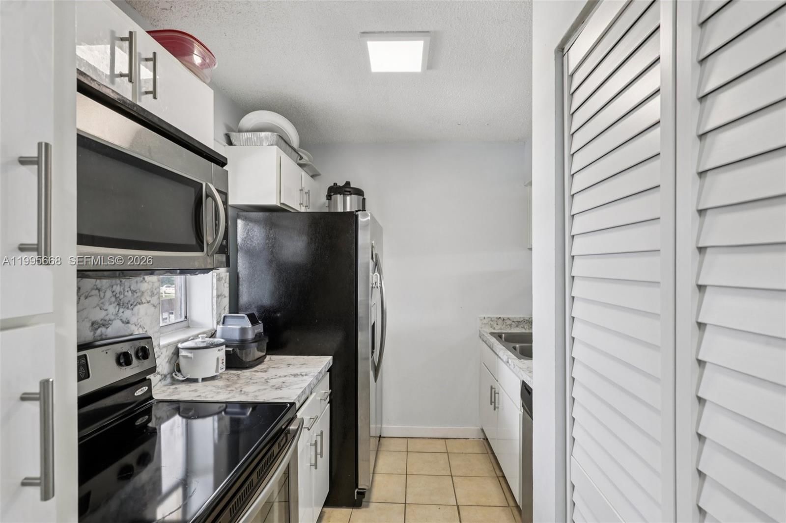 Real estate property located at 9930 Twin Lakes Dr #7-L, Broward, Lakewood Village, Coral Springs, FL