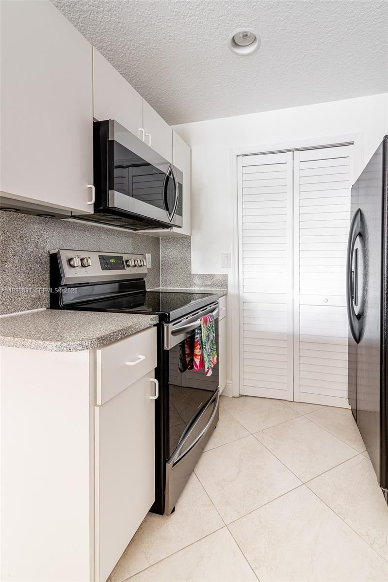 Real estate property located at 6540 114th Ave #1423, Miami-dade, The Courts At Doral Isles, Doral, FL