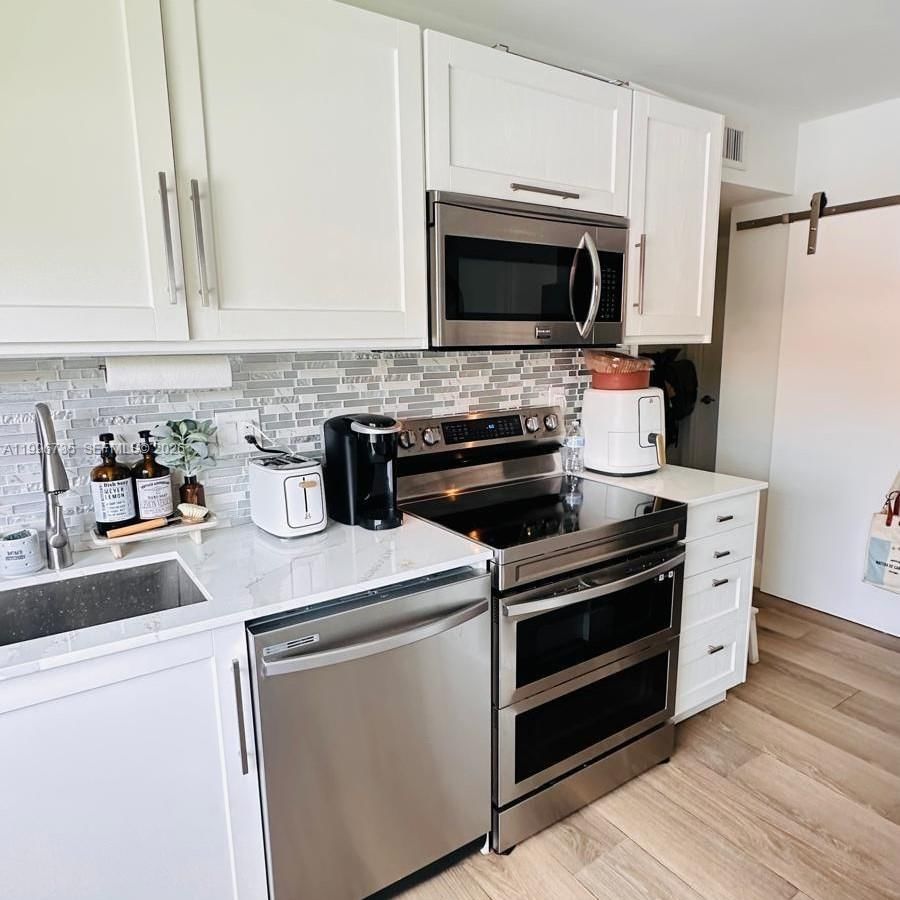 Real estate property located at 223 Lakeview Dr #204, Broward, Racquet Club Apartments A, Weston, FL