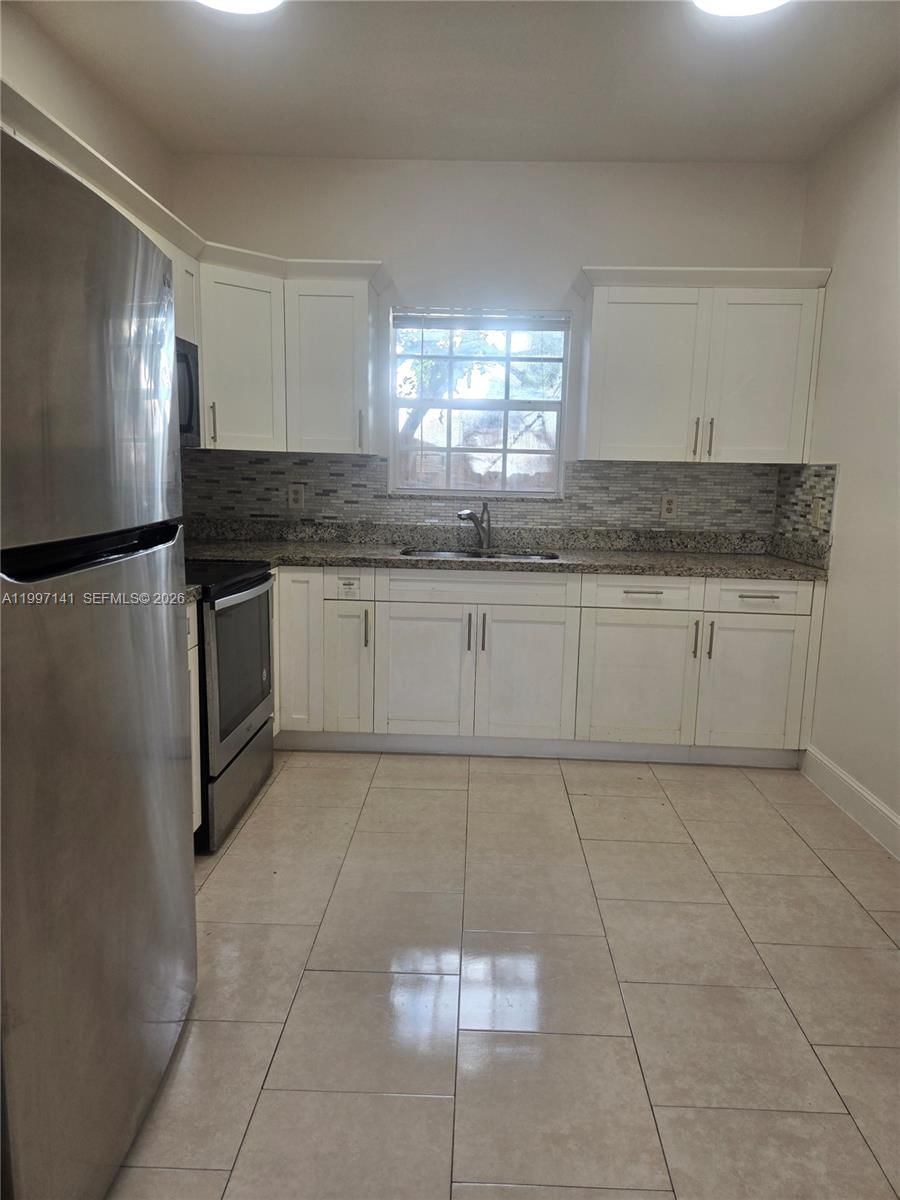 Real estate property located at 9740 5th Ave, Miami-dade, 1st Addn To Pinewood Park, Miami, FL