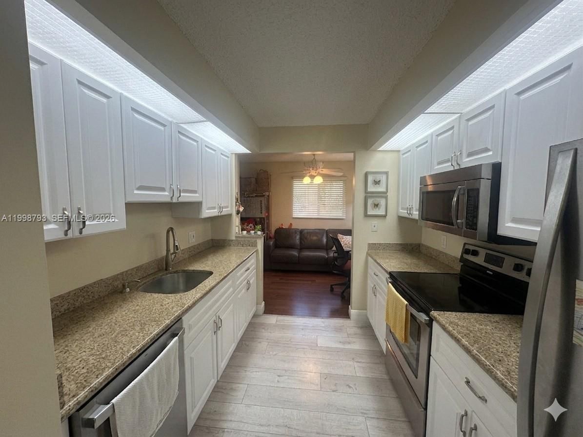 Real estate property located at 1600 127th Way #101C, Broward, Garfield At Century Villa, Pembroke Pines, FL