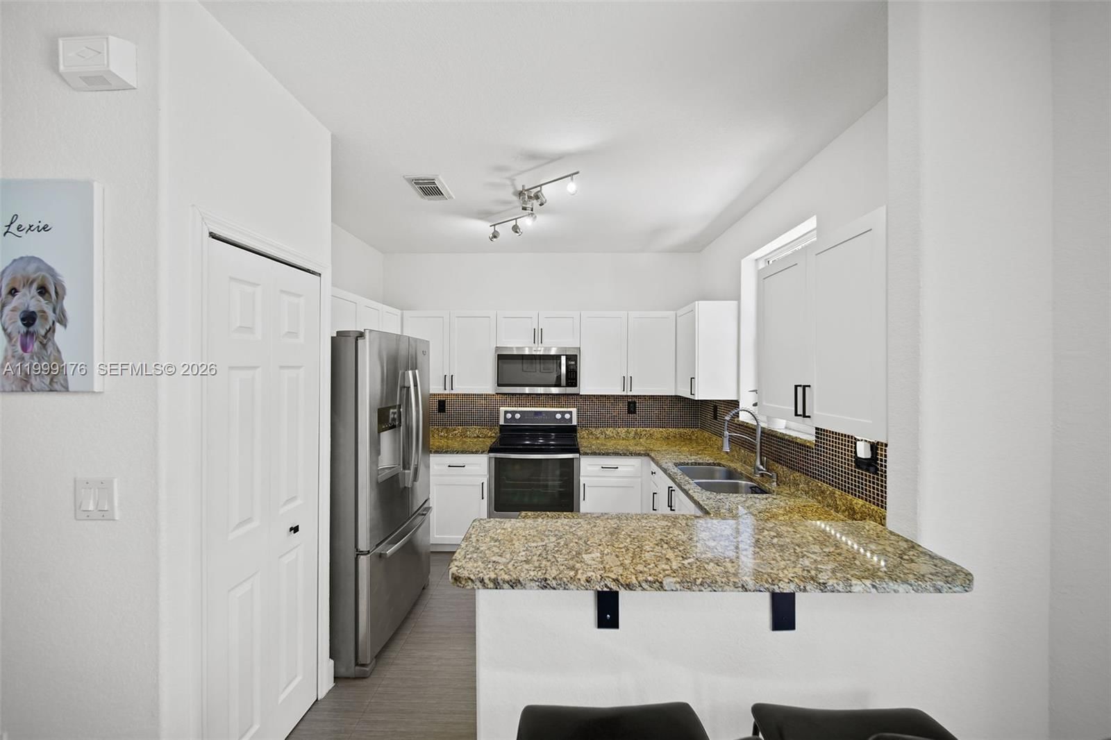 Real estate property located at 11613 78th St, Miami-dade, Doral Isles North Sec Two, Doral, FL